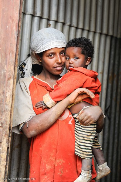 20120330_094816 Nikon D3S 2x3.jpg - One of the mothers of the Pottery group and her 1 year old son